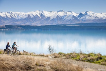Cyclist on the Alps to Ocean Cycle Trail, Lake Pukaki