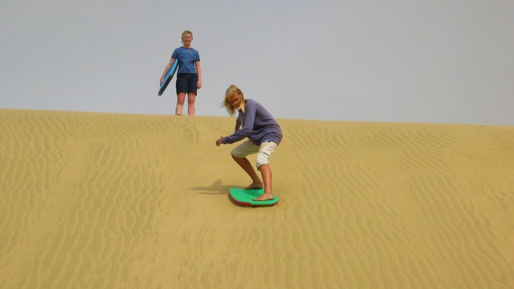 Try sand boarding on the dunes - it's heaps of fun