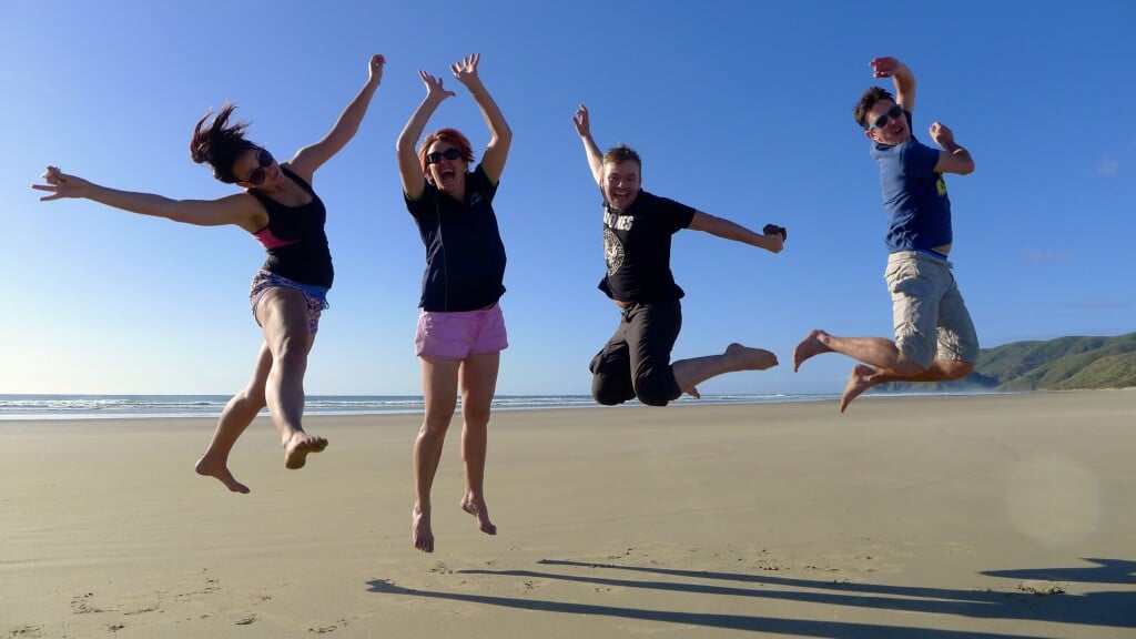 Having fun at Te Werahi Beach