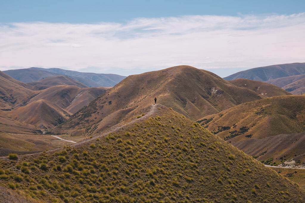 Enjoy the scenic drive through the dramatic Lindis Pass.
