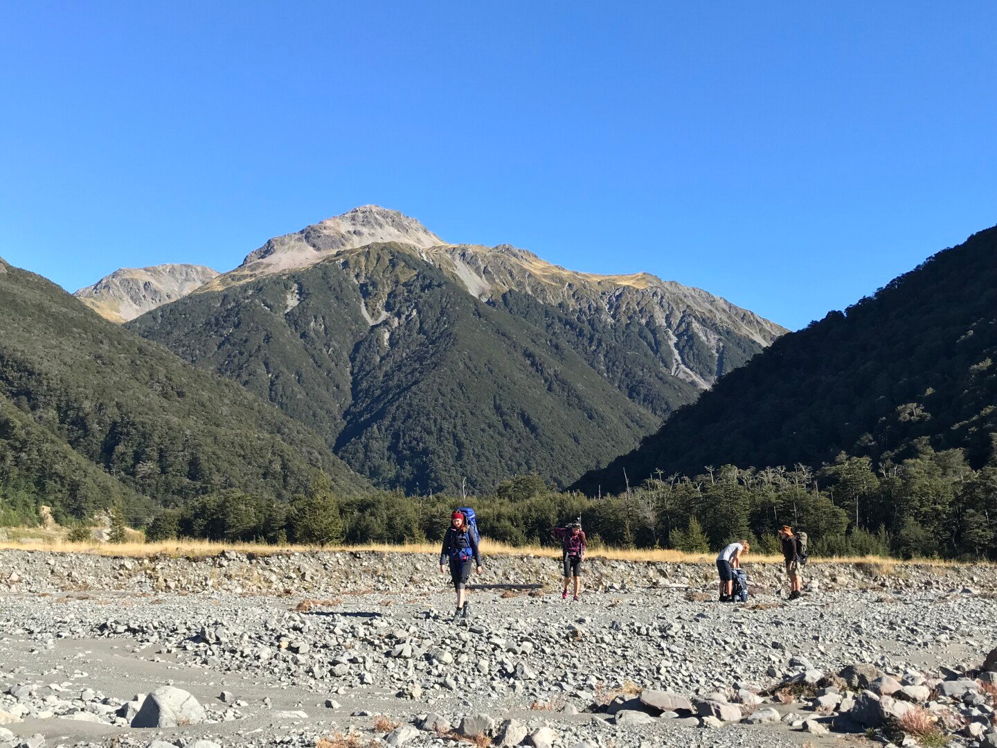 Emerging into the wide and braided Mingha river bed