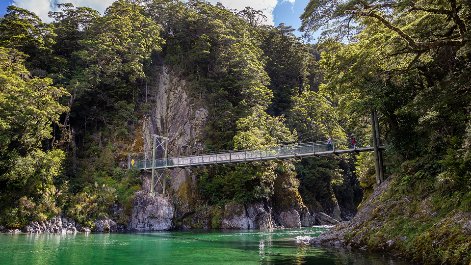 Experience the clear waters of Blue Pools 