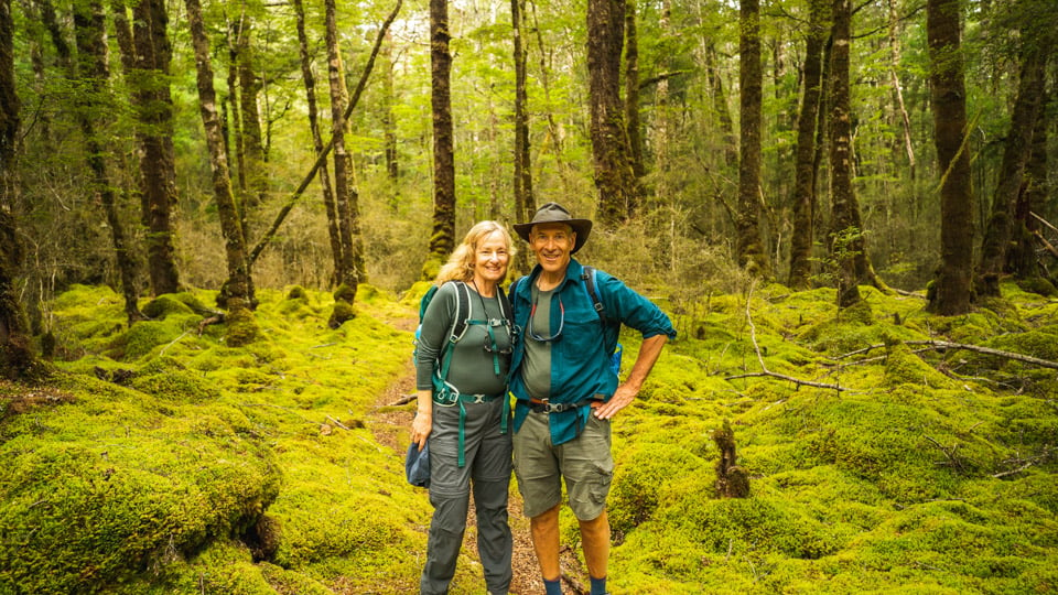 The Kepler Track is renowned for its vivid green moss, native beech forest, and stunning mountain ranges.