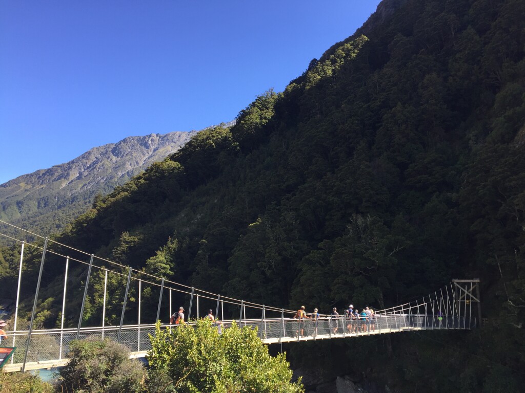 Crossing the Matukituki River before heading up to the Rob Roy Glacier view point