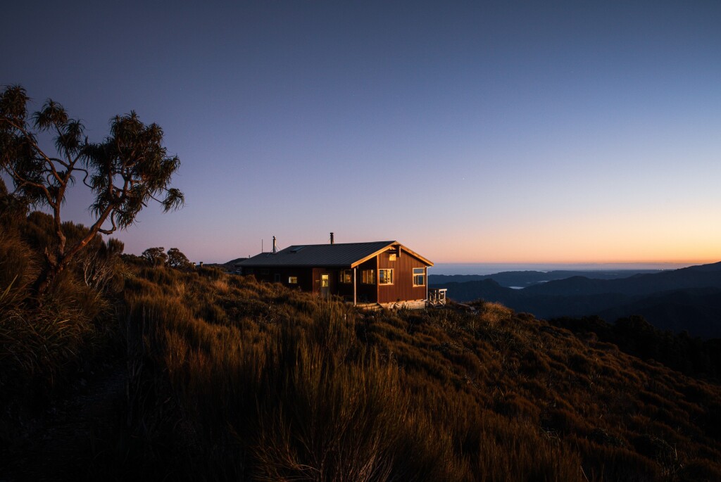 Rest your legs at Moonlight Tops Hut, on a fine day you could catch a beautiful sunset.