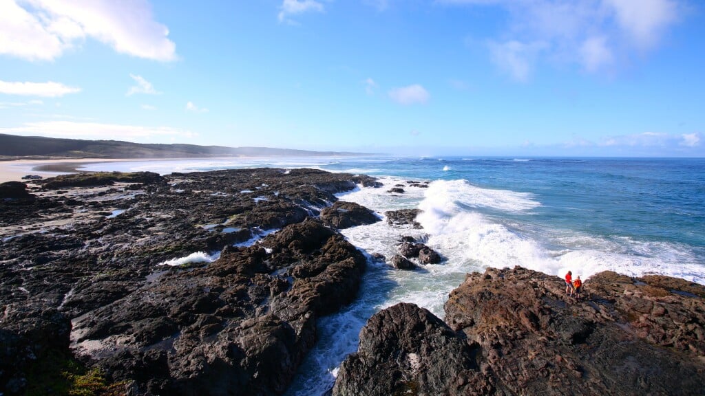 The Tasman's swells crash into the west coast, half way up 90 Mile Beach.