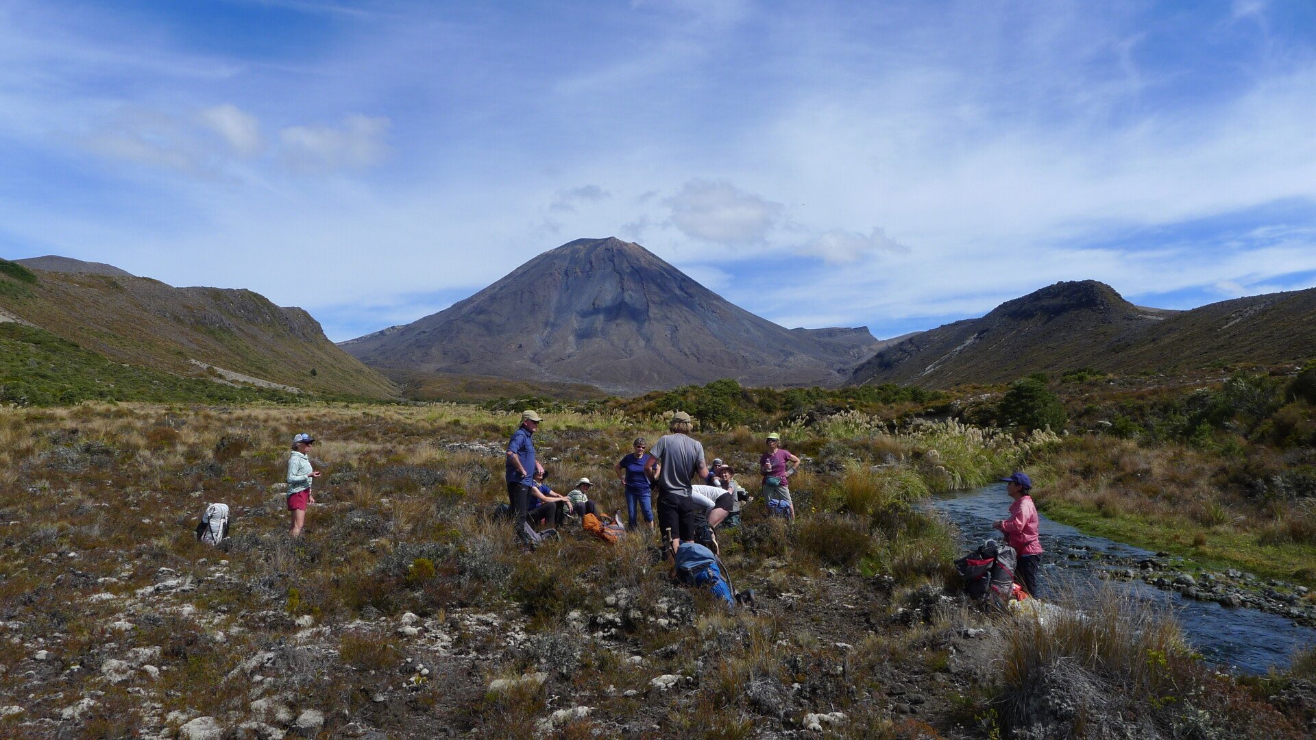 Crossing a stream off-track on the remote east of Tongariro Northern Circuit.